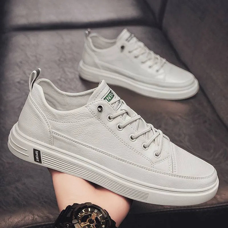 Men's casual white PU shoes with round toe and shallow mouth design on a flat sole.