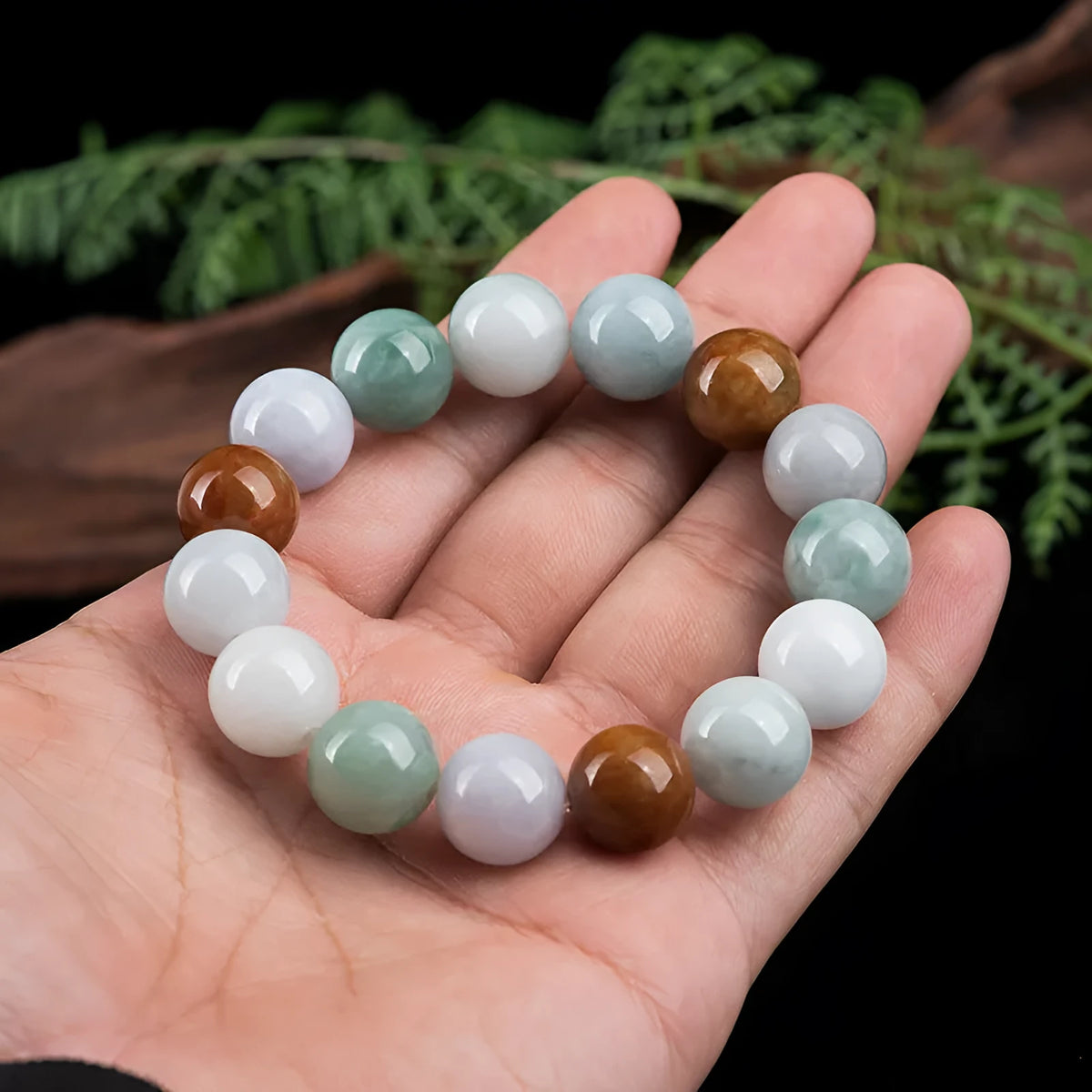 Women's natural Myanmar jade bracelet with three colours in 13mm round beads.