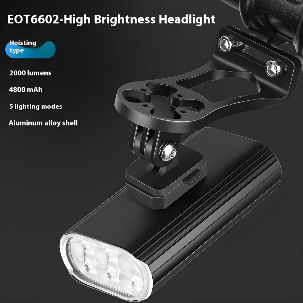 Silver aluminium bicycle headlight showing six XPT lamp beads with USB-C port and quick release mounting brackets