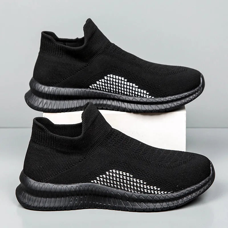 Men's low-top Flyknit popcorn stitch casual sneaker in blue, shown from the side.