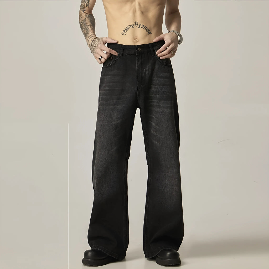 Black loose straight jeans with retro styling and zipper fly on mannequin