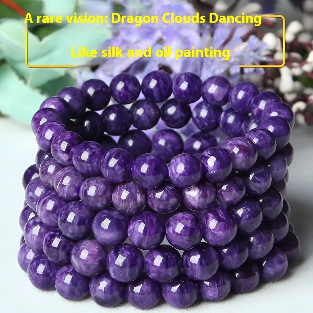 Transparent charoite crystal bracelet on a platinum metal band, showing different bead size options.