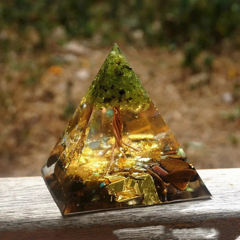 Small 6cm crystal epoxy resin pyramid decoration with natural gravel, shown in a selection of colours including lapis lazuli and obsidian.