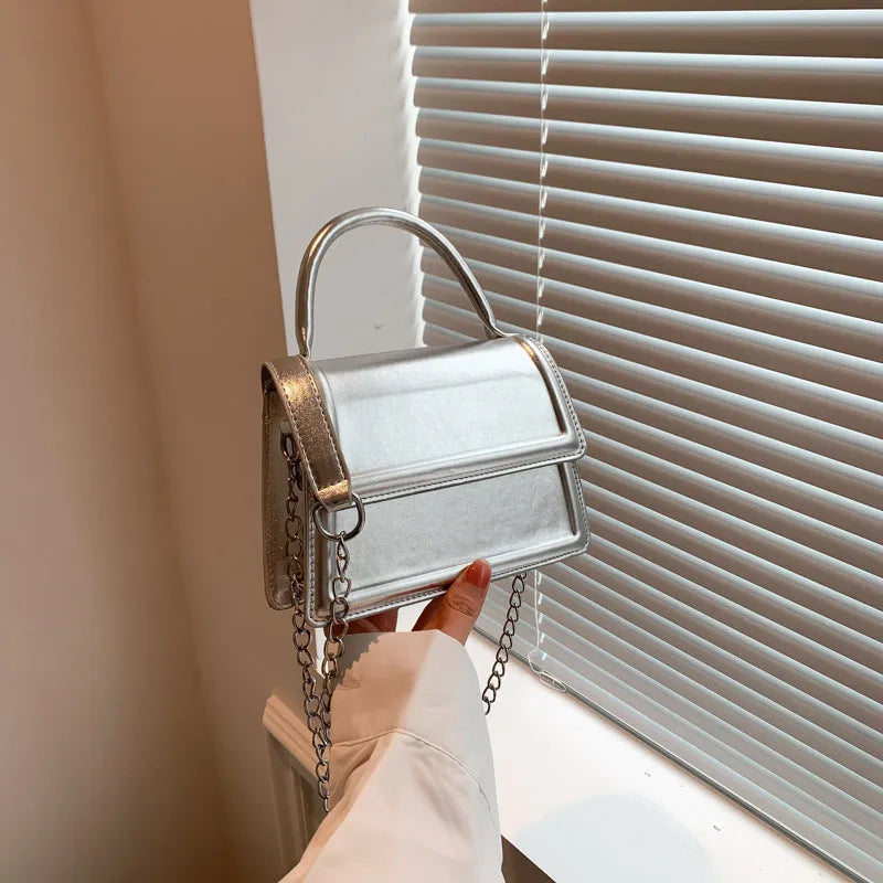Retro PU leather crossbody shoulder bag with horizontal square shape and sewing line detailing