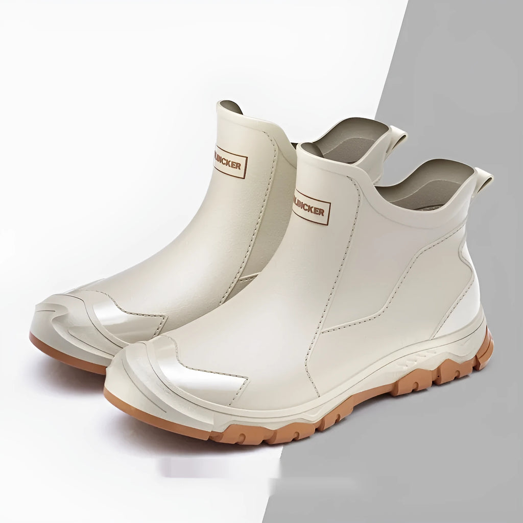 Short tube PVC wading shoes with a round toe and non-slip plastic sole on a flat heel.