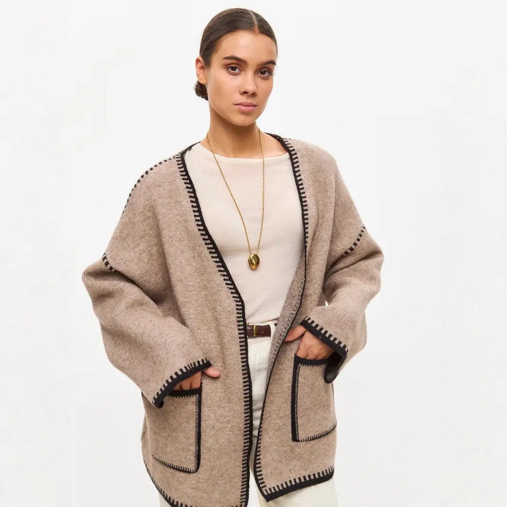 Lace-up front knitted cardigan in a thick imitation cashmere blend, shown in camel colour