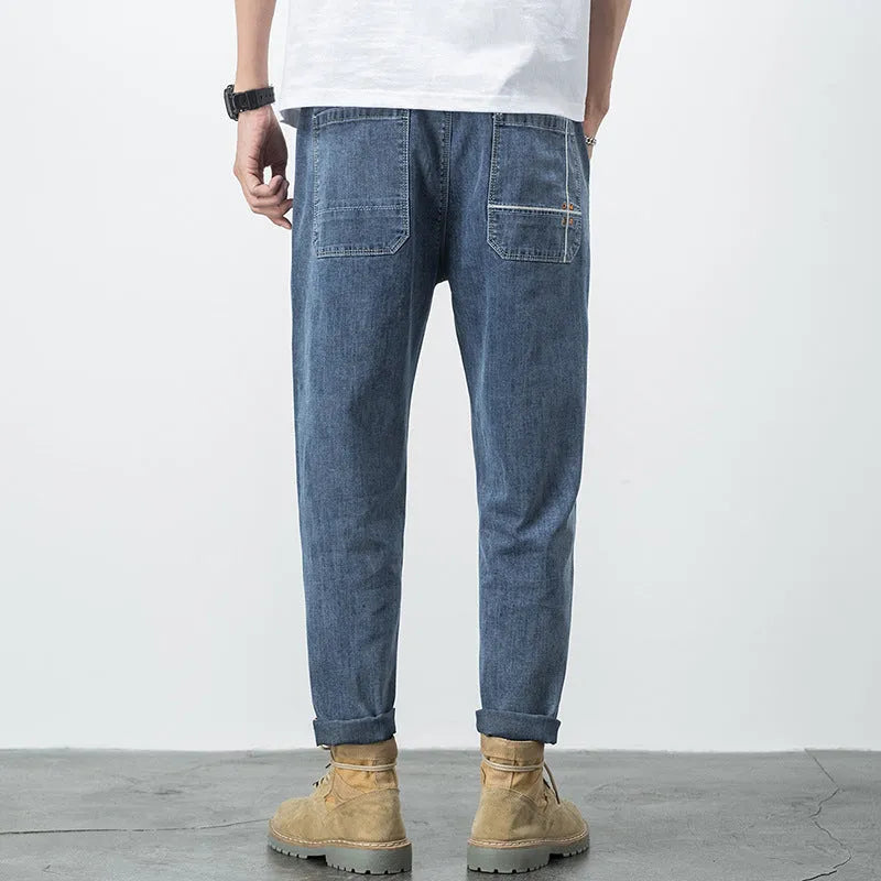 Men's loose fit plus size jeans with elastic mid waist, thin cotton denim, blue or black, sizes L to 7XL