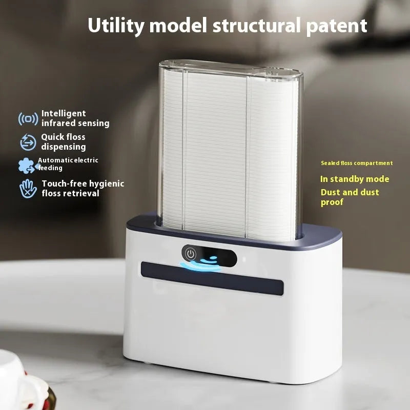 Intelligent induction dental floss box in dark grey, light grey, and gold colours showing automatic pop-up mechanism.