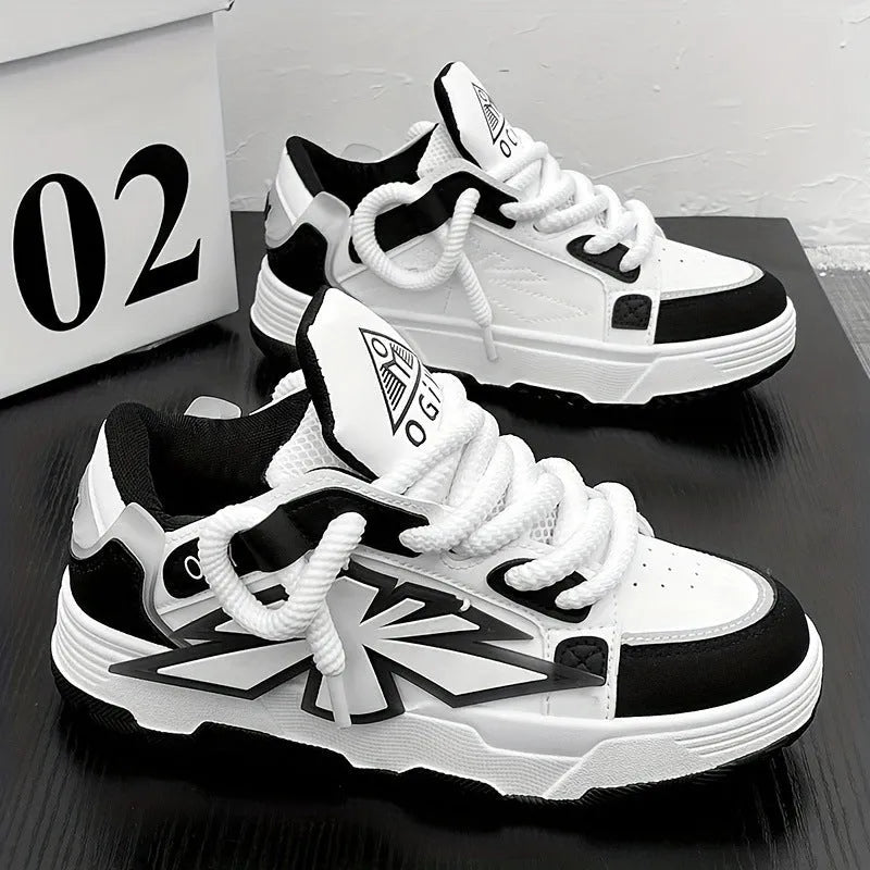 Men's white chunky sneakers with cartoon pattern, thick rubber sole, and lace-up front.