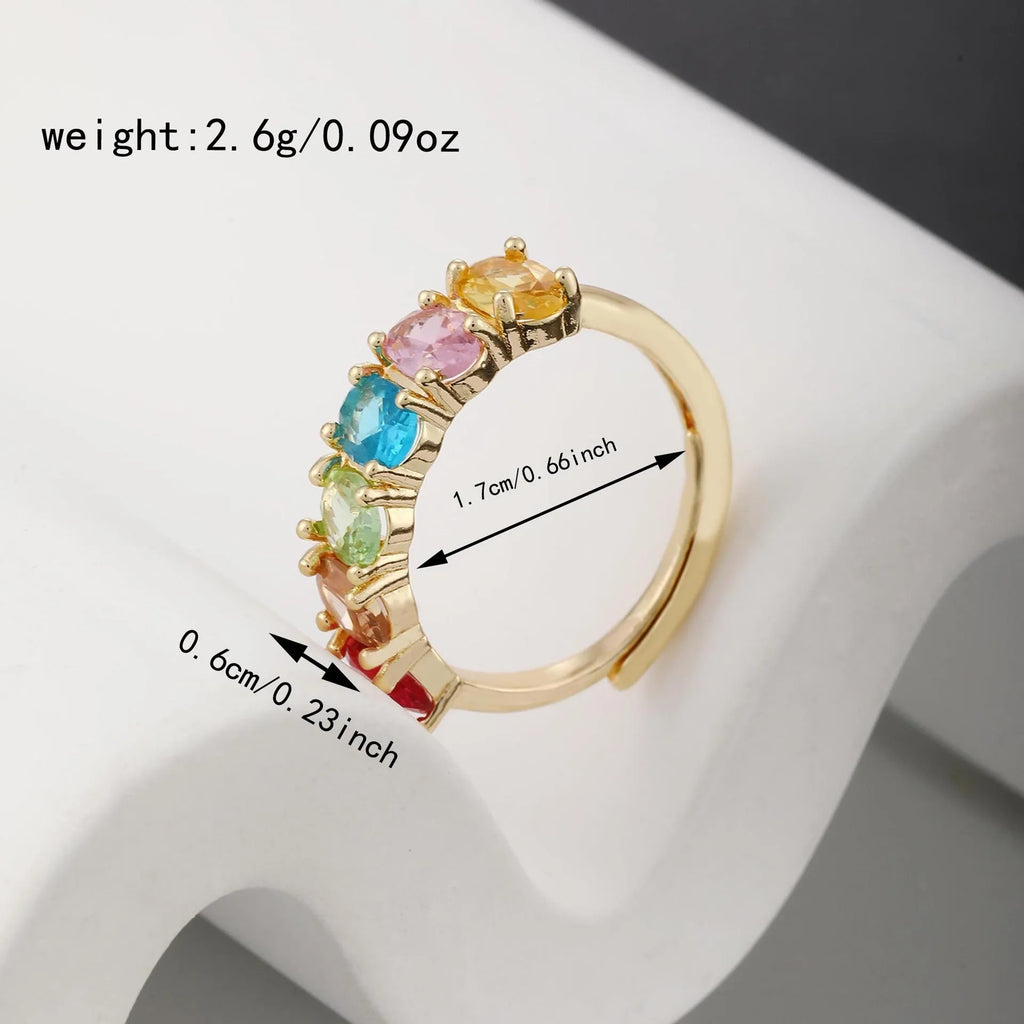 Women's adjustable gold-coloured ring with zircon stones in retro design