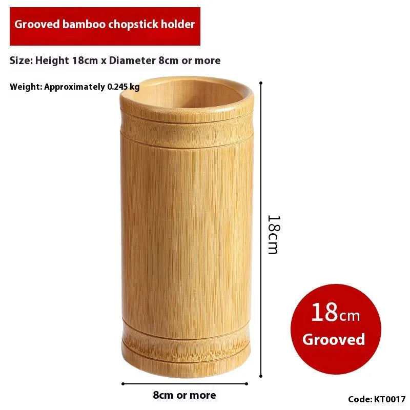 A natural bamboo tube chopsticks holder for multi-purpose storage on a wooden table.