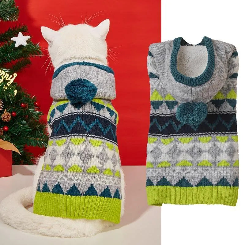 Blue diamond pattern acrylic knitted dog sweater laid flat, showing pullover neck and textured knit.