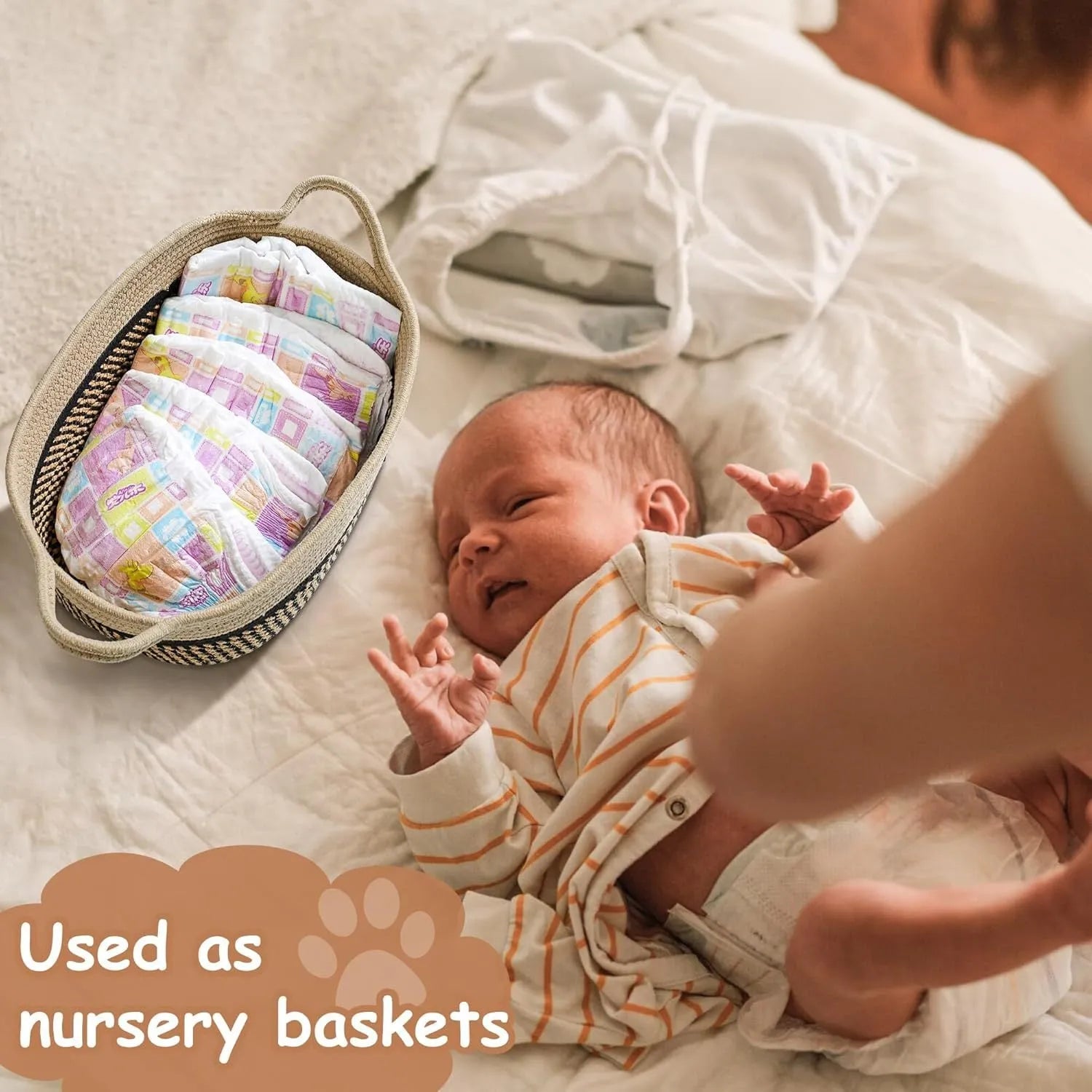 Light beige handmade cotton rope storage basket with wooden base and handle on a wooden floor