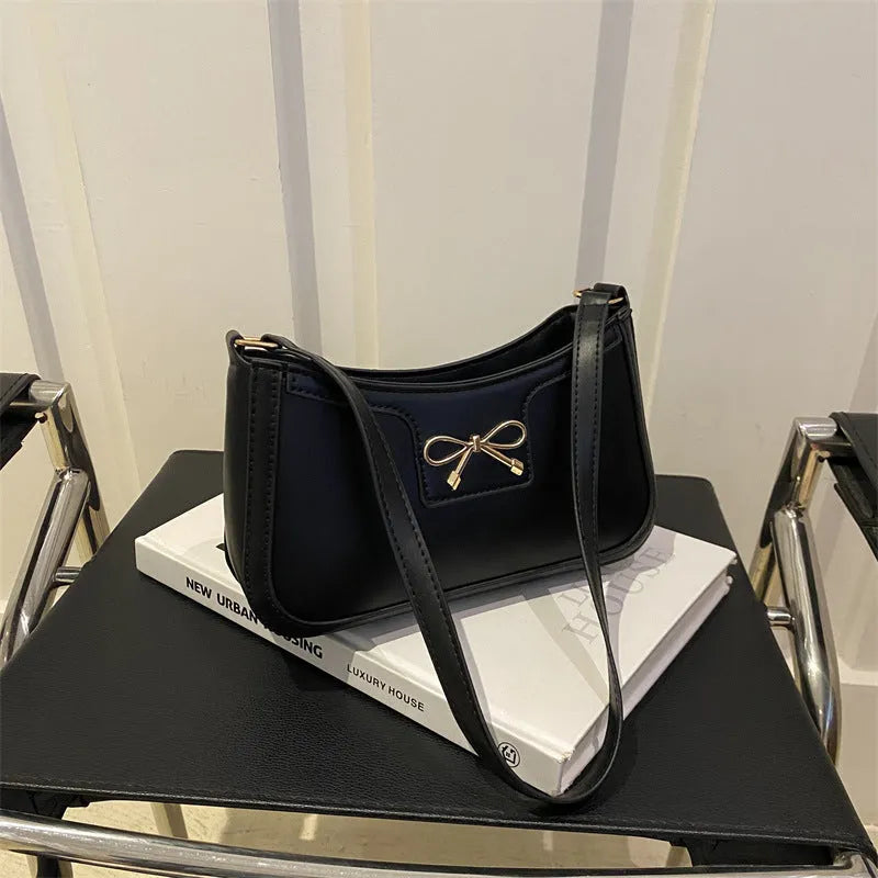 Western style baguette shoulder bag in six colours with 24x14x5cm dimensions and single strap