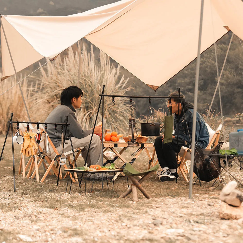 Large foldable aluminium alloy triangle frame camping drying rack with multiple hooks, shown with optional side hanger and top tray.