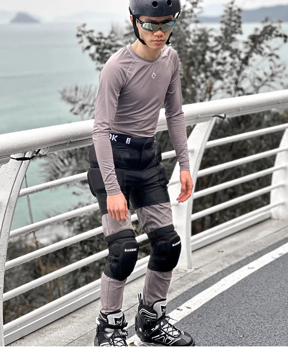 Black spandex hip protection pants with NBR foam padding for roller skating and skiing safety