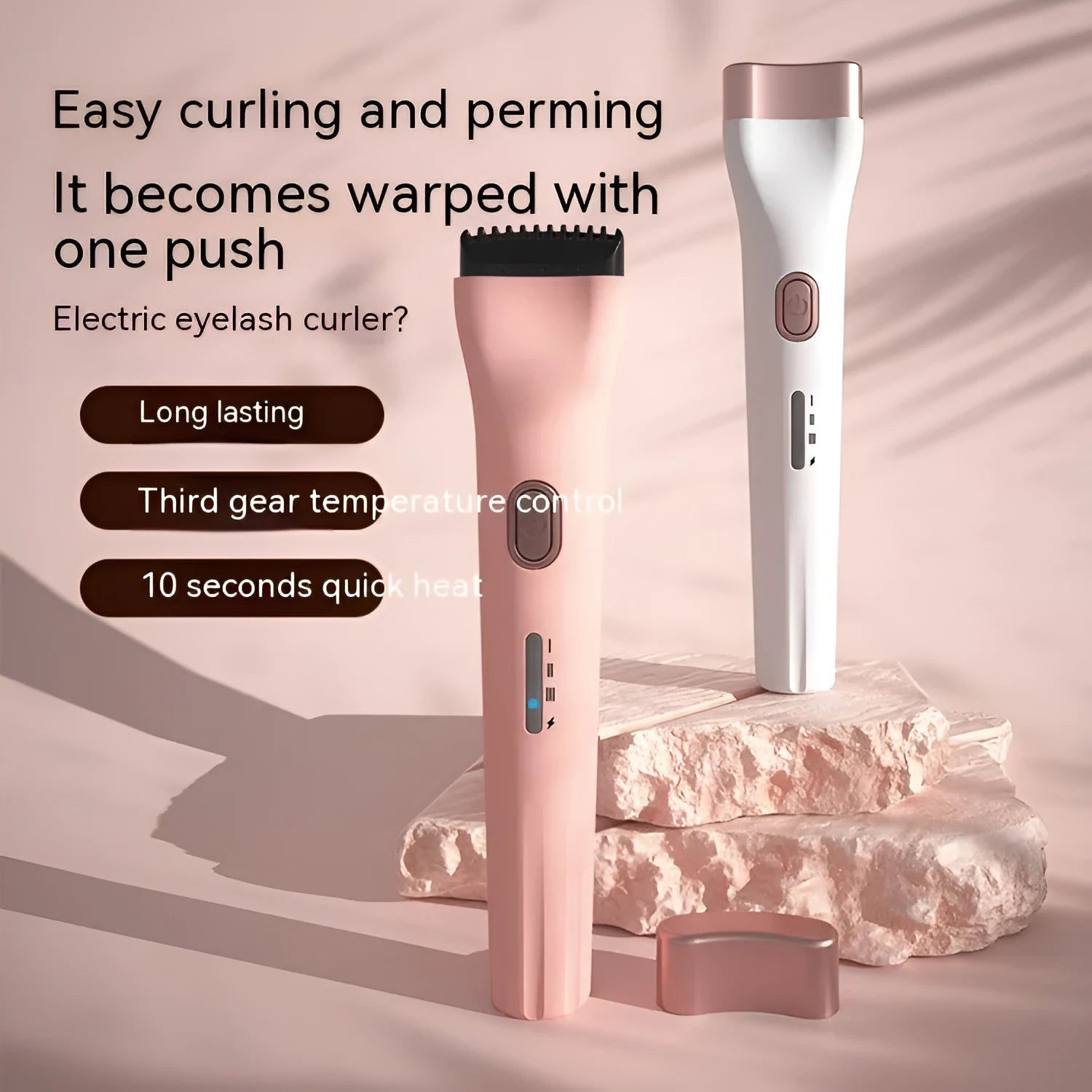 Portable electric eyelash curler with temperature control in pink colour