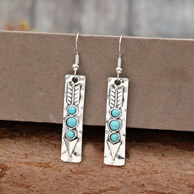 Silver geometric women's earrings with long strip design and inlaid turquoise detailing