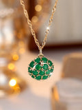 Round emerald and diamond necklace with adjustable chain in champagne gold