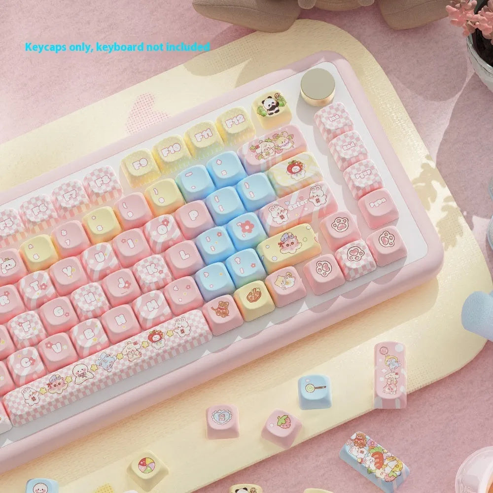 Doll-themed mechanical keyboard keycap set with sublimation printed designs in boxed packaging