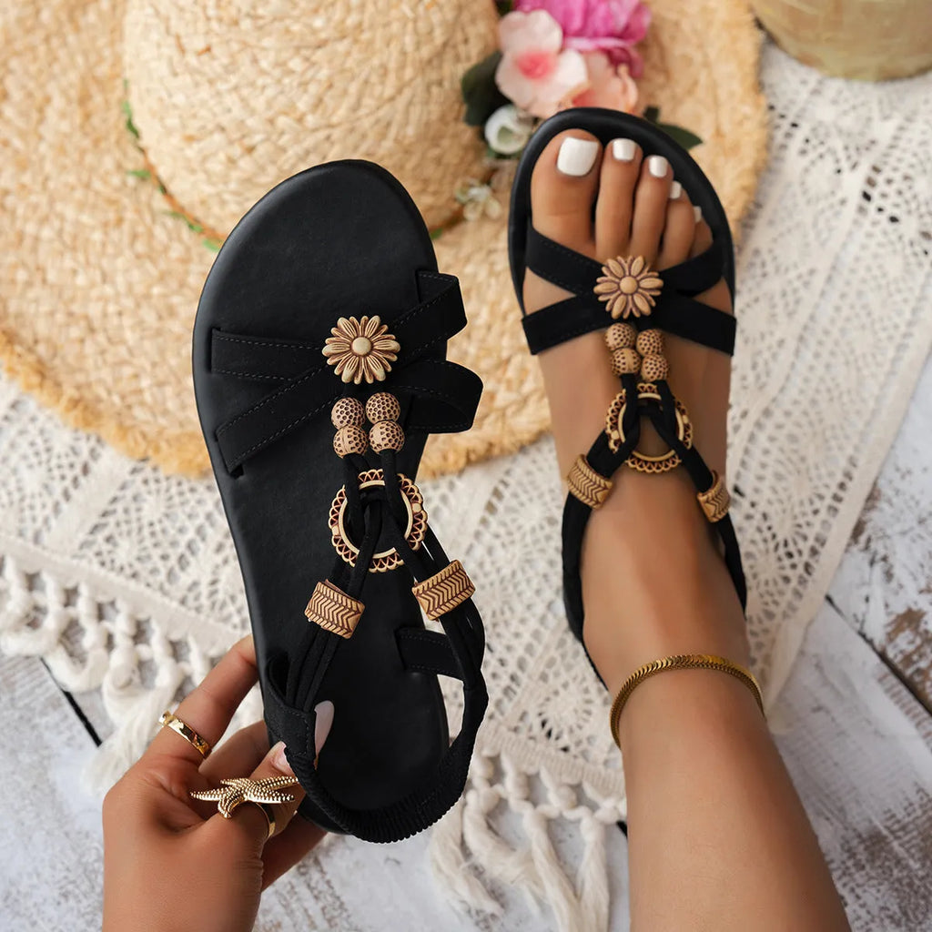 Women's black ethnic beaded flat beach sandals with open toe and elastic band closure