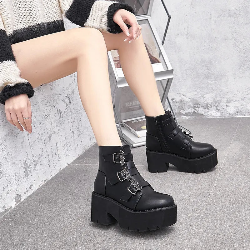 Black women's Harajuku punk ankle boots with a bat-shaped buckle and side zipper.
