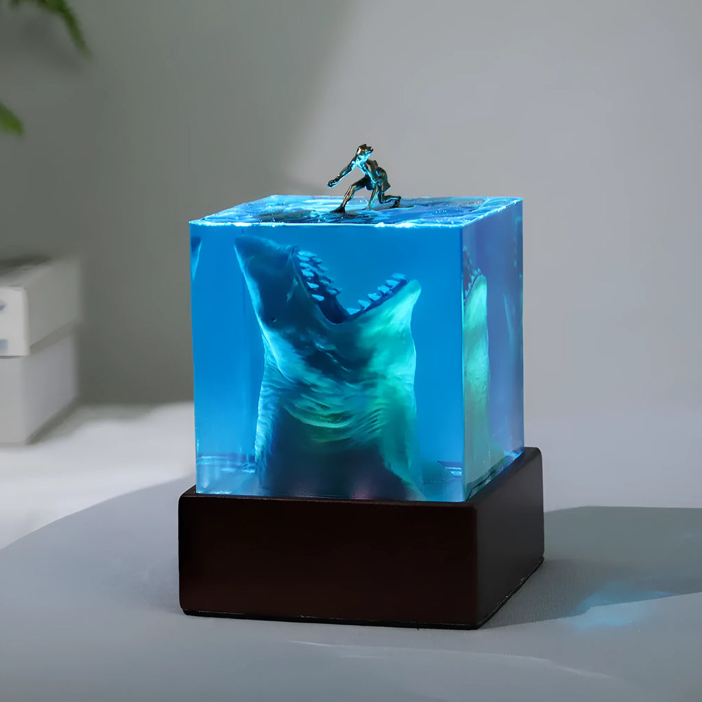Ocean shark surfer micro landscape night light made of clear epoxy resin on a plastic stand