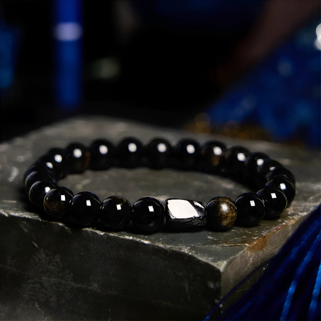 Natural obsidian single ring bracelet with 8mm stone in gold obsidian colour variation