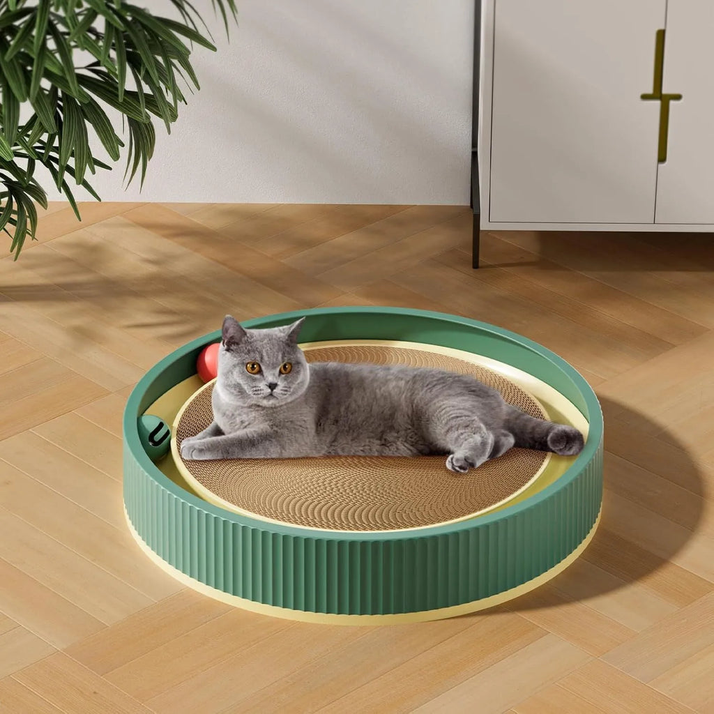 Large green circular cat scratching board with integrated moving ball toys and a spring plush ball.