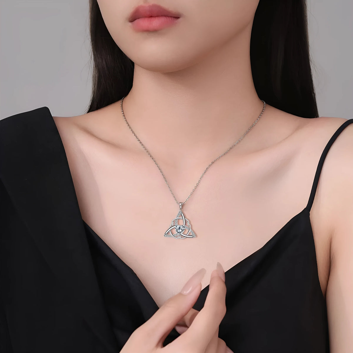 Geometric Celtic knot women's necklace in electroplated copper, shown in one of four colour options.