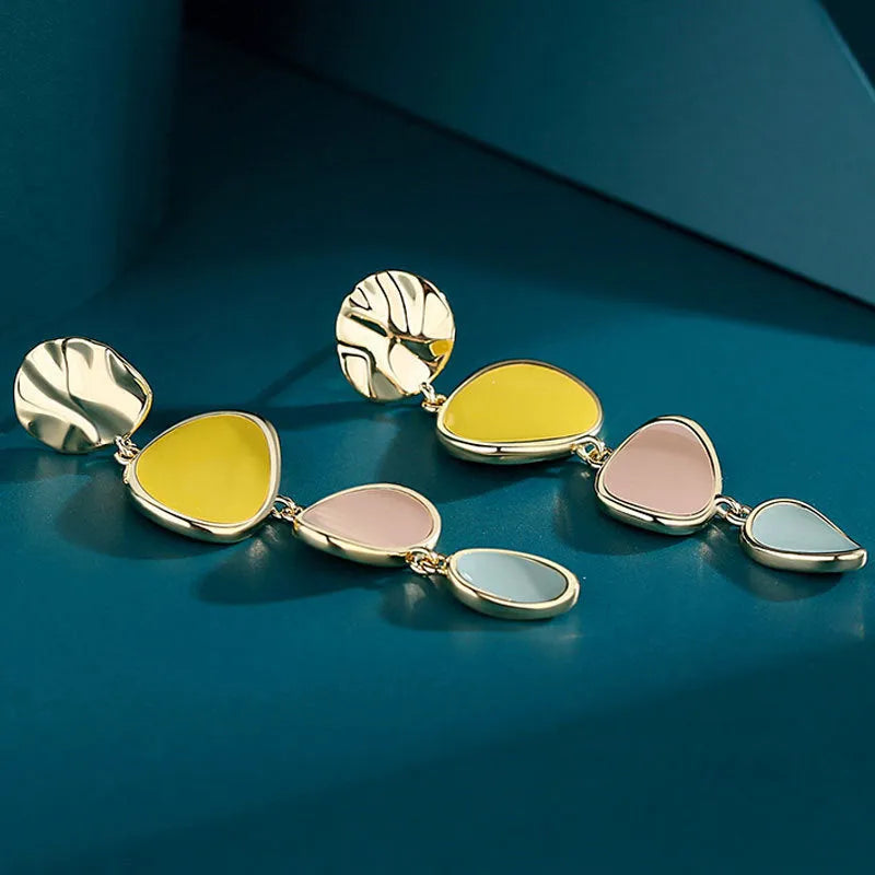 Morandi three-colour wafer disc earrings with dripping oil effect on sterling silver finish alloy.