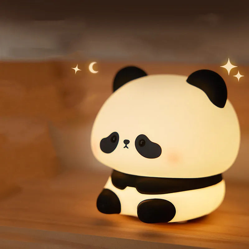 Cartoon panda night light with soft glow, showing BPA-free silicone construction and compact 150x130x80mm dimensions