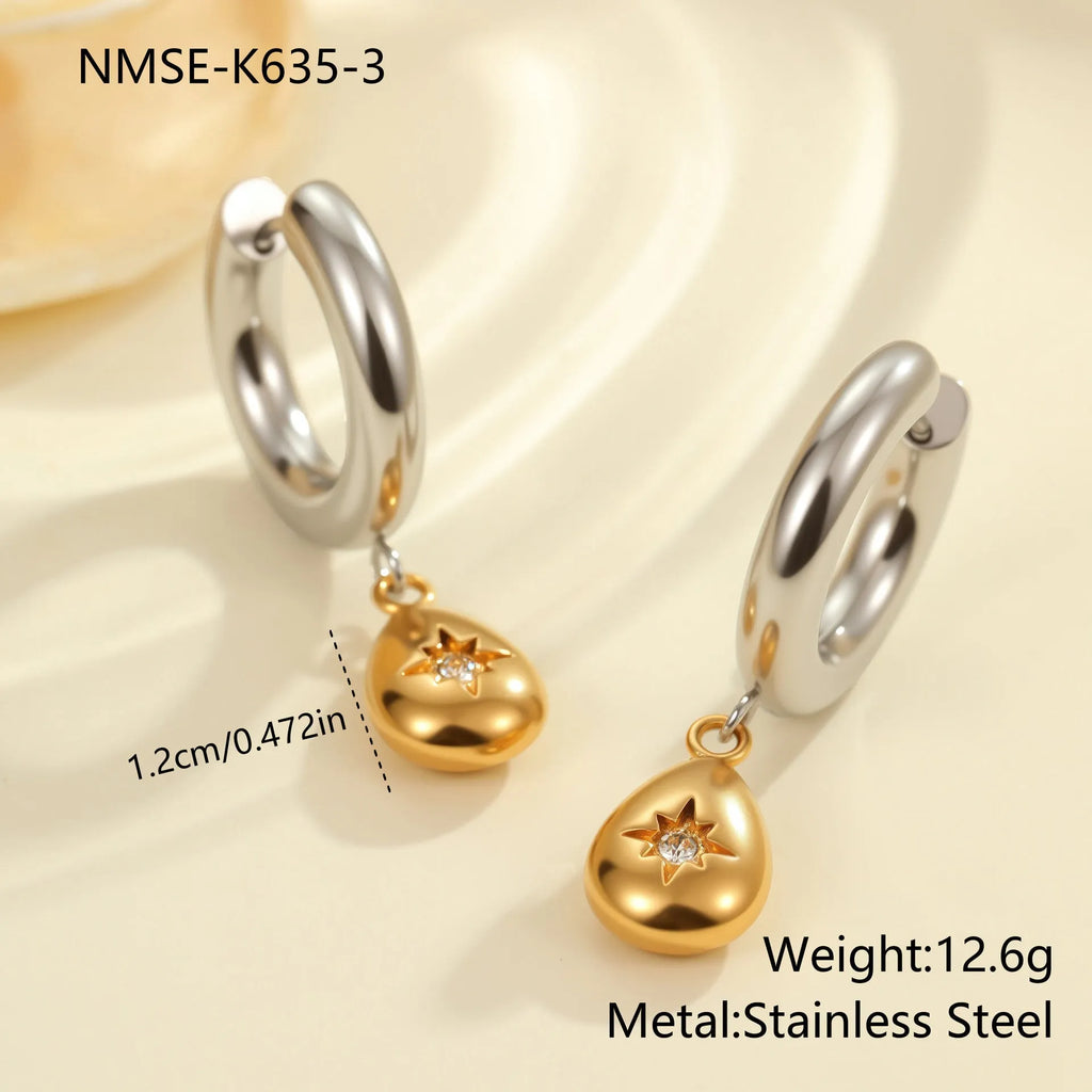 Christmas tree shaped heart earrings with star motifs in gold electroplated stainless steel