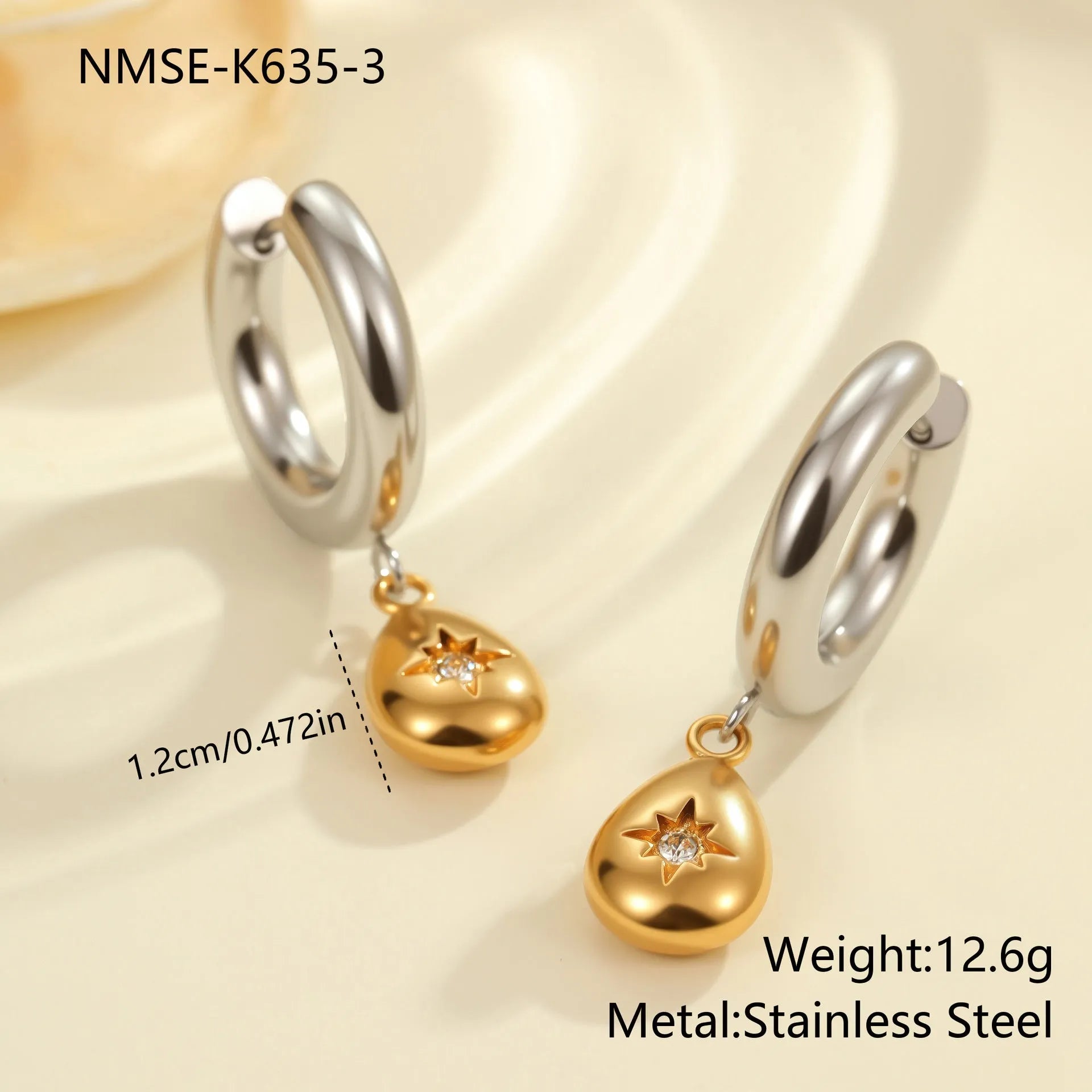 Christmas tree shaped heart earrings with star motifs in gold electroplated stainless steel