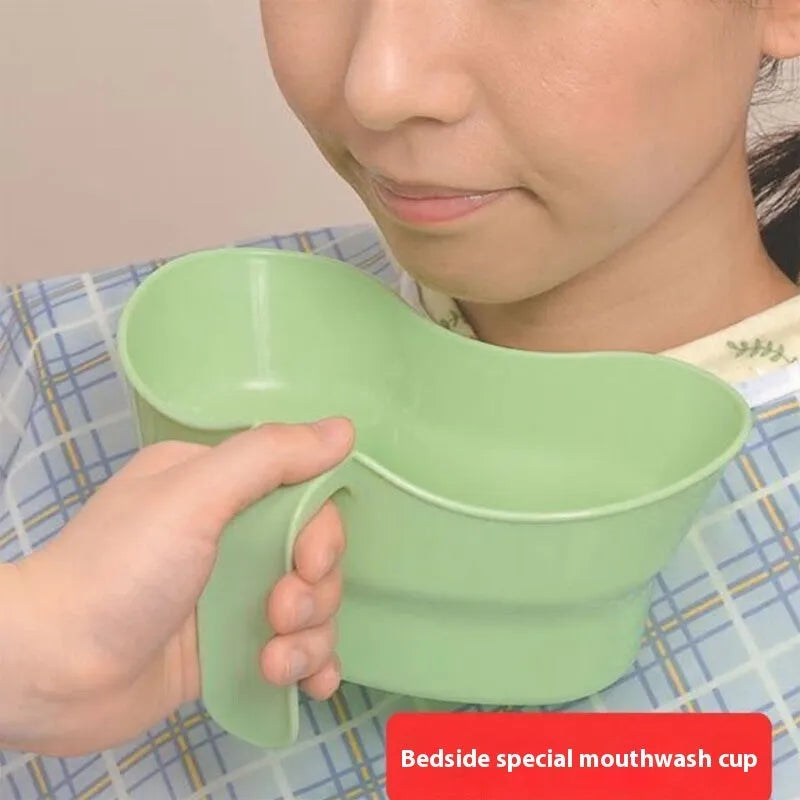 Green plastic gargle cup for bedridden elderly patient oral hygiene assistance