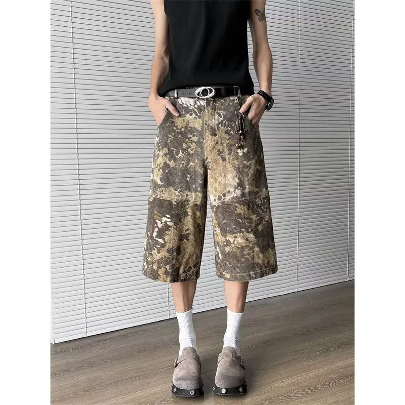 Yellow snake pattern camouflage cropped jeans on a model.