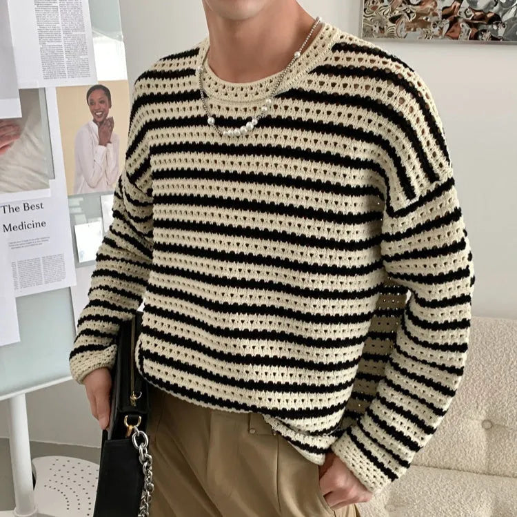 Men's black loose fit long sleeve sweater cotton blend on model front view