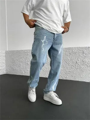 Men's blue straight-leg cotton denim jeans with loose fit and mid-waist design