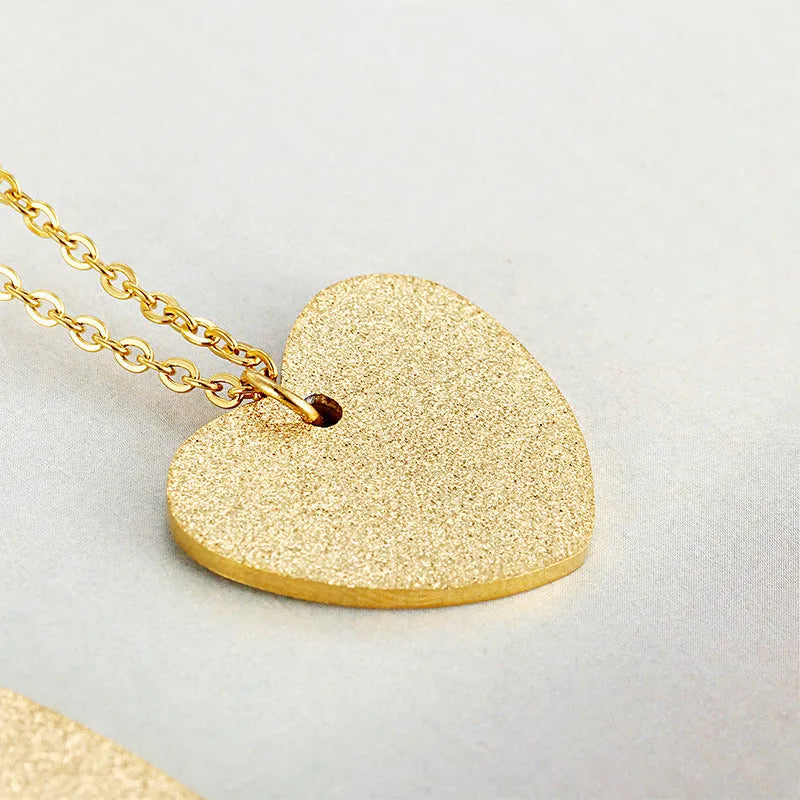 Women's titanium steel necklace with a geometric heart-shaped pendant in colour KN25736-Z