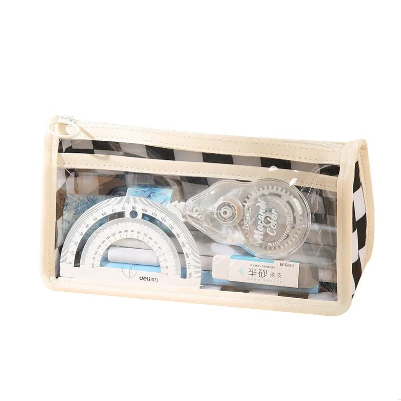 Transparent PVC pencil case with chessboard grid pattern showing pens inside, dimensions 21.5cm x 8cm x 11.5cm