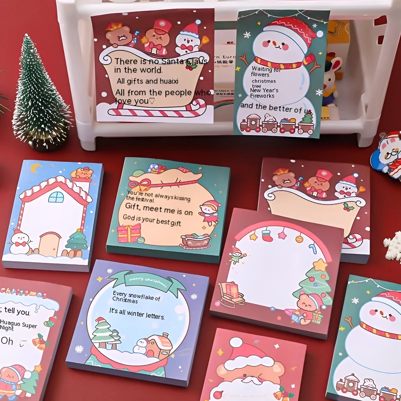 Christmas cartoon sticky notes pad with festive designs including Santa Claus and snowman