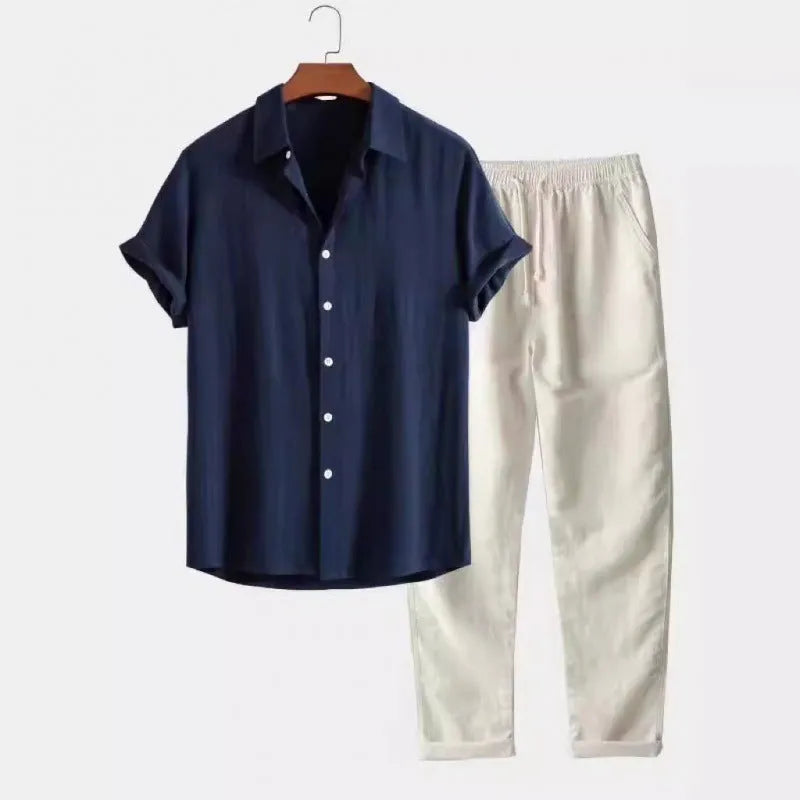 Man wearing casual loose short sleeve shirt and matching trousers in linen-style fabric