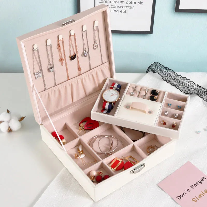 Red PU leather jewelry storage box with compartments for necklaces and rings