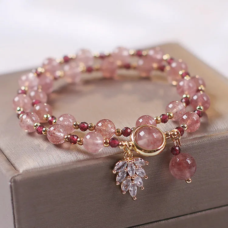 Women's double-layer strawberry quartz crystal bracelet with a Lucky Cat charm in red cat's eye flowers colour.