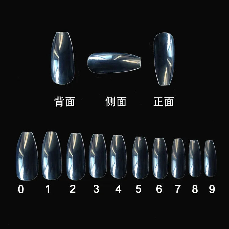 500 clear acrylic false nails in 10 sizes, made from ABS plastic, arranged on a table.