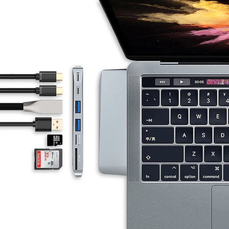 USB-C hub adapter for MacBook Pro with eight interfaces including USB ports and card readers