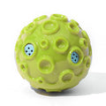 Natural rubber dog toy ball with textured surface in choice of five colours for aggressive chewers