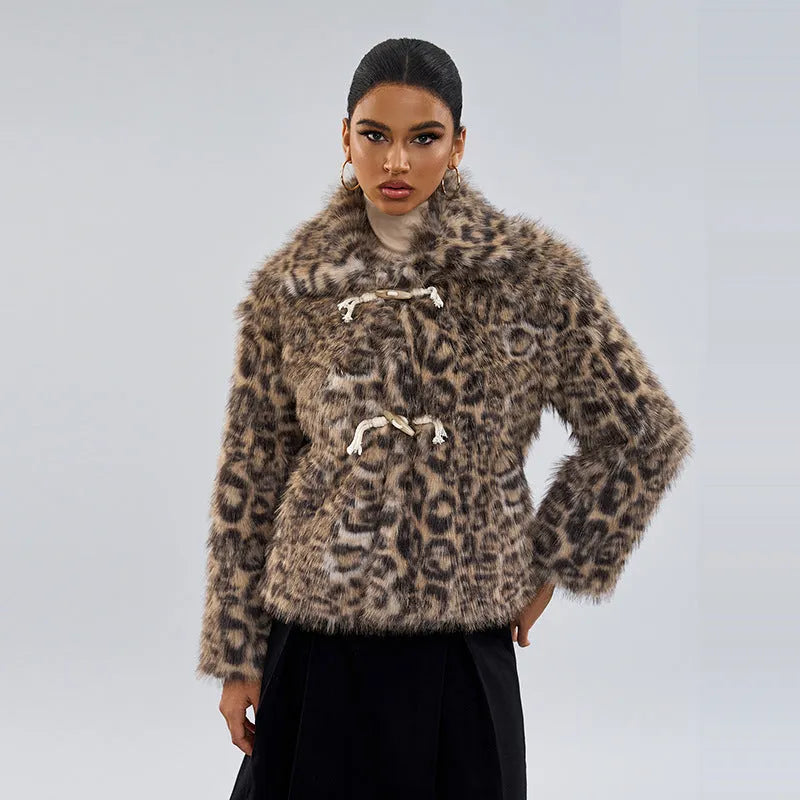 Women's leopard print polyester coat with regular sleeves on a hanger
