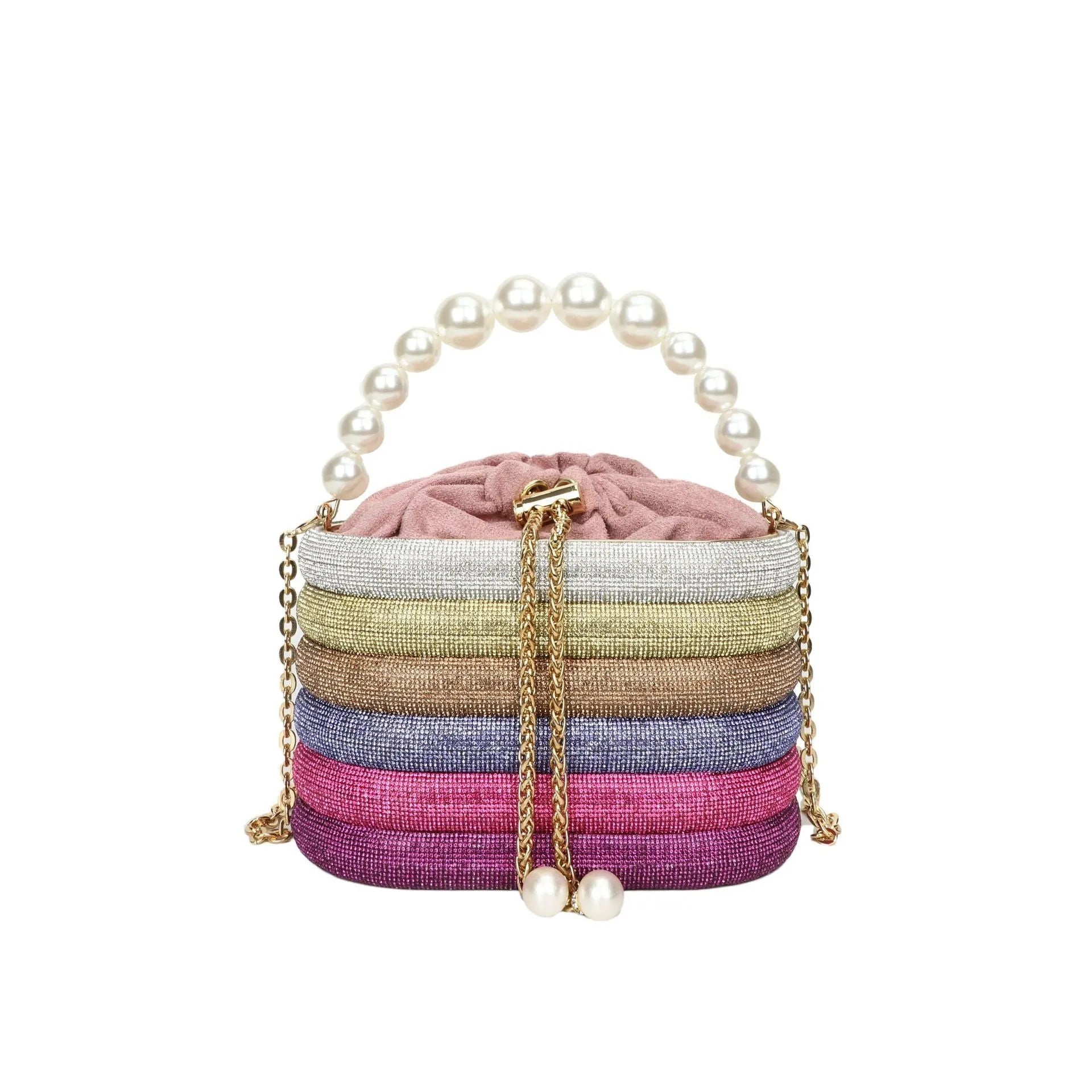 Round women's crossbody bag with beaded pearl details and single shoulder strap in retro styling