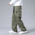 Boys in army green straight leg cargo pants with large pockets and a drawstring waist.
